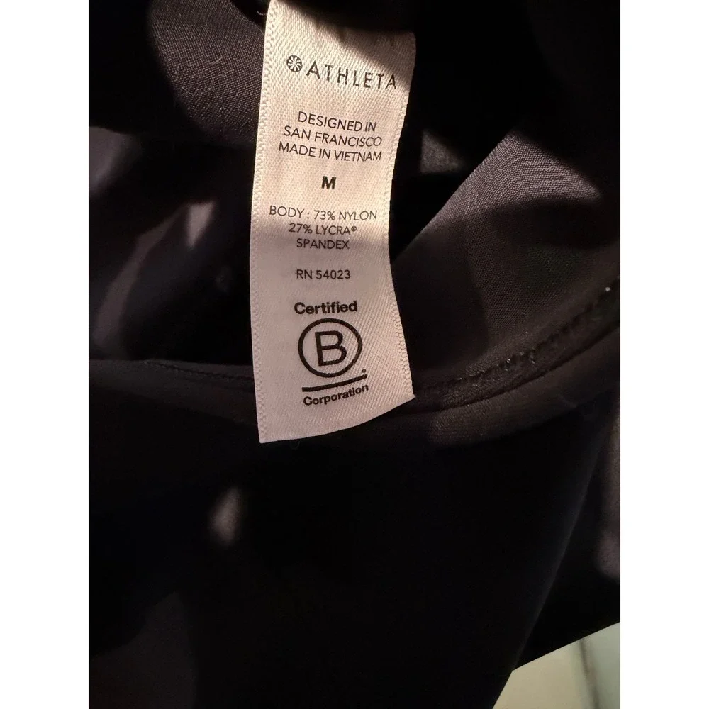 Athleta Stellar Tight Black Zip Pocket Workout Leggings‎ Women's Size M